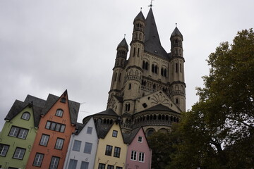 Fototapeta na wymiar Church and houses in Cologne Germany