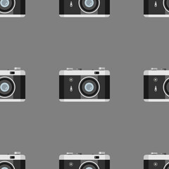 Flat retro black camera for photo on gray background. Seamless style business technology pattern.