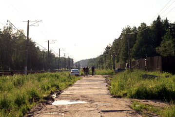 country road along the railway