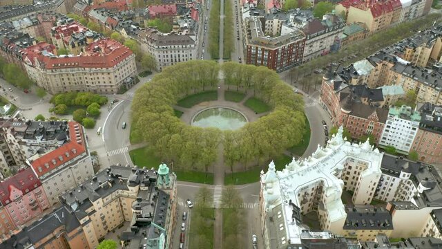 Aerial view Karlaplan Park, Square and Fountain in Stockholm, Sweden. Cinematic.