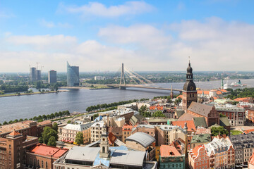 City panorama from above, Riga, Latvia. Beautiful view of the old town and the Daugava river on a sunny day.