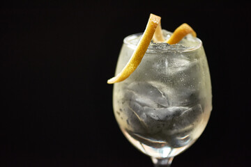 Cocktail with Lemon Twist on Black Background