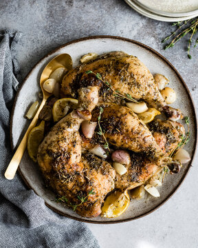 Chicken casserole on a serving plate with a spoon.