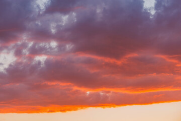 Amazing cloudscape on the sky at sunset time.