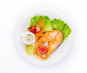 Salmon steak with vegetable