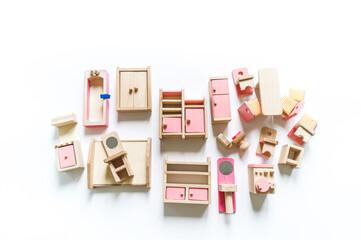 Montessori material. Wooden furniture for the doll house.