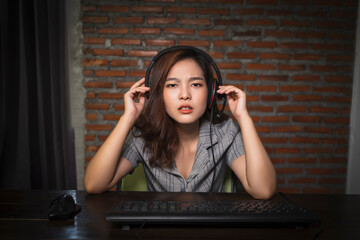 Asian Gamer girl woman nerdy geek casual playing video games computer angry rage mad confused upset...