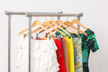 Rental fashion clothes concept. Festive clothes on the rail. Fashion blog, website, social media hero header.