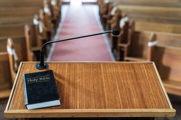 view of church pulpit with bible on it, overlooking the church
 - obrazy, fototapety, plakaty
