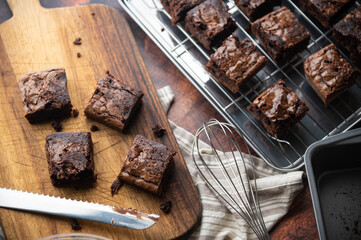 chocolate brownies with ingredients and baking tools