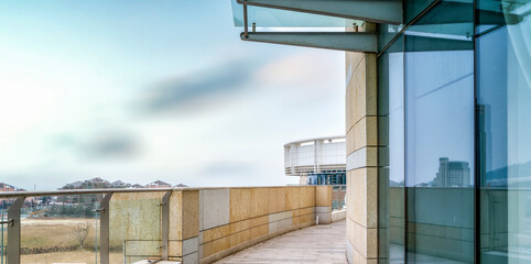 Naklejka premium Glass wall of modern high-rise building