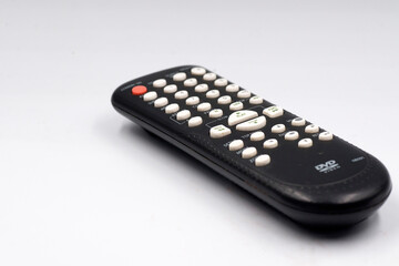 Old fashioned TV remote control isolated on white