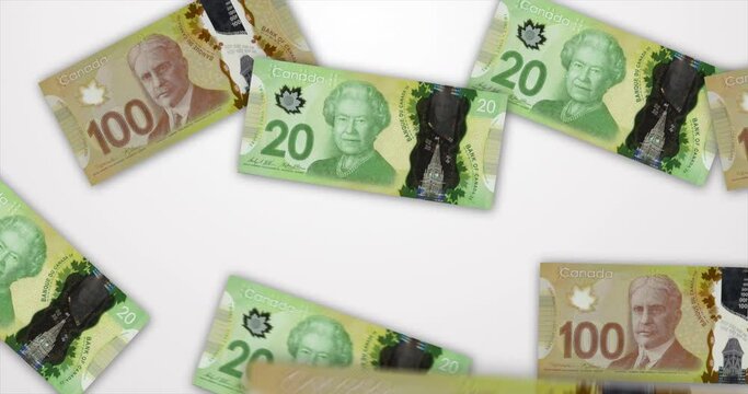 Falling Canadian Bills of 20 and 100 dollars currency on a white background