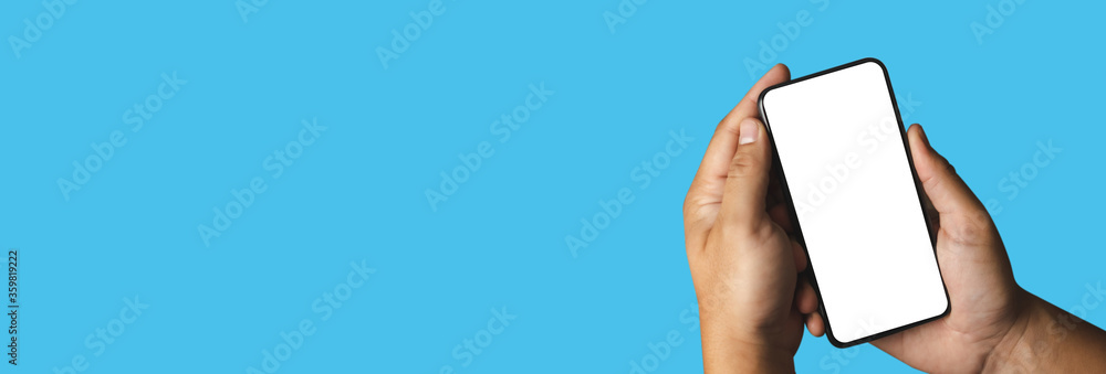 Poster man using mock up a cell phone with blank screen space banner