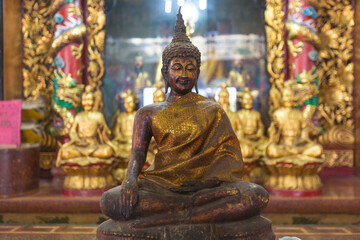 Monk statue at Sothonwararam temple in Thailand
