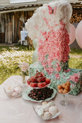 
party table with desserts and treats for the girl’s birthday