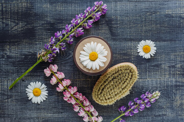 Cosmetic bottle containers with hermal camomile flowers Blank label for mock-up