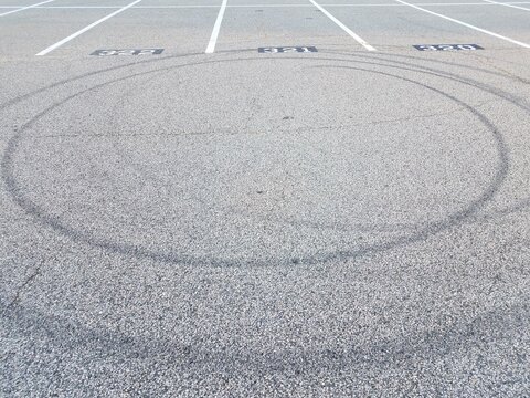 spiral or circle skid marks in parking lot