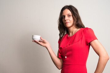 Portrait of beautiful businesswoman holding coffee cup