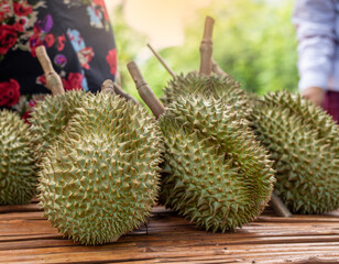 Durian fruit for sale to customers on the table. Durian market in Thailand.