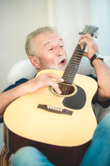 seniors father, elderly dad are playing guitar and music at home, relax activity and stay at home with family
