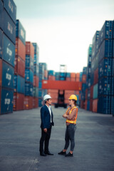 Executives and chief engineers are currently inspecting work in the international shipping depots, container yard, Concepts of importing and exporting lndustrial business