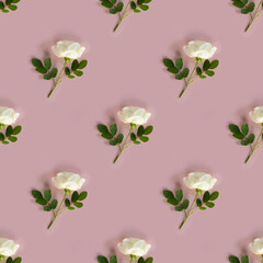 Seamless pattern with white rose with steam and green leaves on pastel pink background. Photographic collage. Creative flower background, wallpaper or postcard. Pop art trendy picture. St. Valentine's