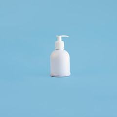 White plastic mockup dispenser on light blue background. Bottle with pump, hand sanitizer for virus and infection. Antiseptic drug, Hygiene and Health concept. Square with copy space.