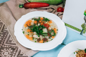 Vegetable soup in btorh with herbs and spices