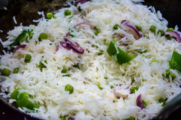 Indian Pulav or vegetables rice, Rise with fresh Peas rise, Ingredients rice, green peas. isolated on black background. 
