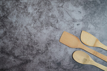 Three bamboo spatulas at bottom right corner.