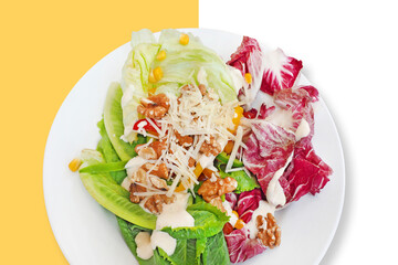 fresh salad with walnut topped with cheese isolated