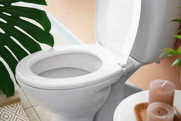 Modern toilet bowl in interior of restroom