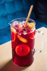 cold sangria with fresh fruits and berries