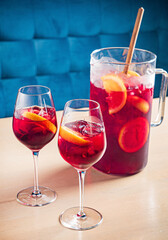 cold sangria with fresh fruits and berries