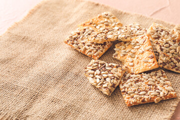 Cereal cookies on sackcloth, closeup