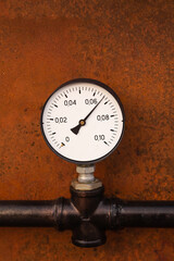 pressure adjustment close-up on a background of rusty iron engineering