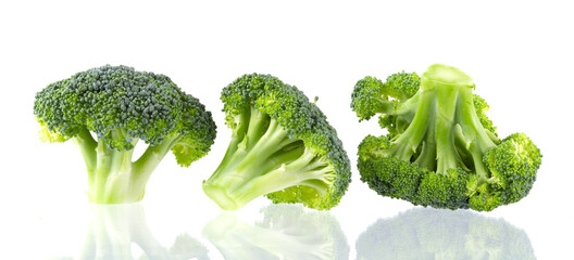 Fresh three green tasty broccoli in closeup isolated on white background