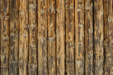 wooden planks stacked vertically beige and brown old weathered pattern