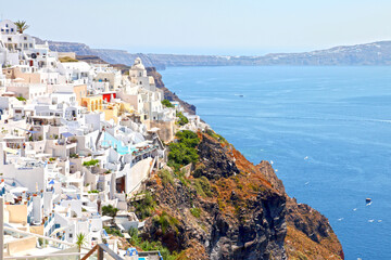 Fototapeta na wymiar View of Fira town at the top of a cliff in Santorini, Greece. 