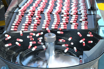 factory of the pharmaceutical industry. pills on the conveyor