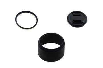 photographic equipment set of a lens hood, a protective lens and a lens cap on an isolated background