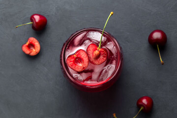 Flat lay with fruit drink made of cherries and ice