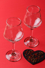 Two glasses of beer for lovers. Octoberfest. Valentines day. Happy couple concept. Bright red background.