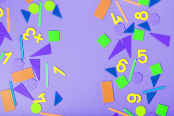 Colorful figures and numbers for children on a pink background. A tool for developing children's thinking.