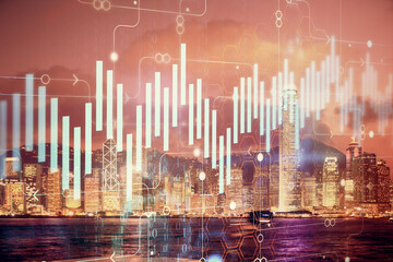 Multi exposure of forex chart drawings over cityscape background. Concept of success.