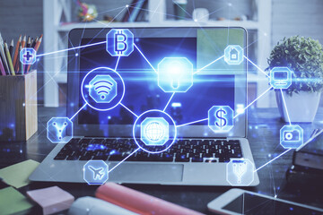 Computer on desktop with social network hologram. Double exposure. Concept of international people connections.