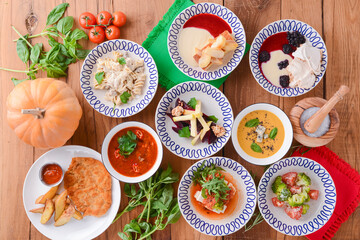 Table served for thanksgiving dinner. Autumn food on white background. Flat lay, top view, copy space