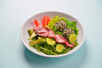 Fresh and organic vegetable salad with raw veggies - tomatoes, cucumbers, avocado. Flat lay, copy space banner.