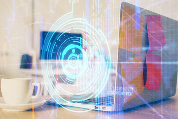 Obraz premium Multi exposure of desktop computer and technology theme hologram. Concept of software development.